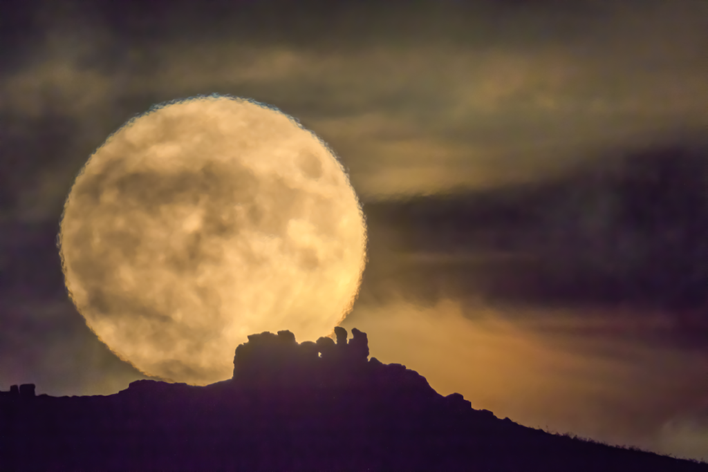 Supermoon over Three Fingers Rock, Caer Caradoc Shropshire UK. The Times cover photo © Andrew Fusek Peter