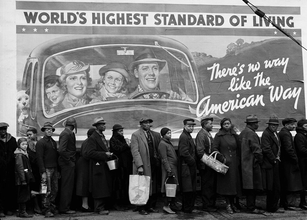 Margaret Bourke-White, African American flood victims lined up to get food and clothing from a Red Cross relief station