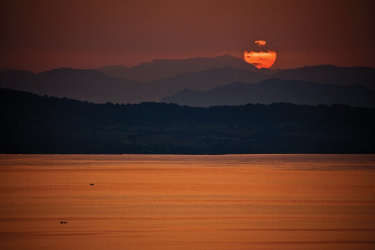 Nico Marziali, Alba sul lago di Bracciano, con il Terminillo sullo sfondo